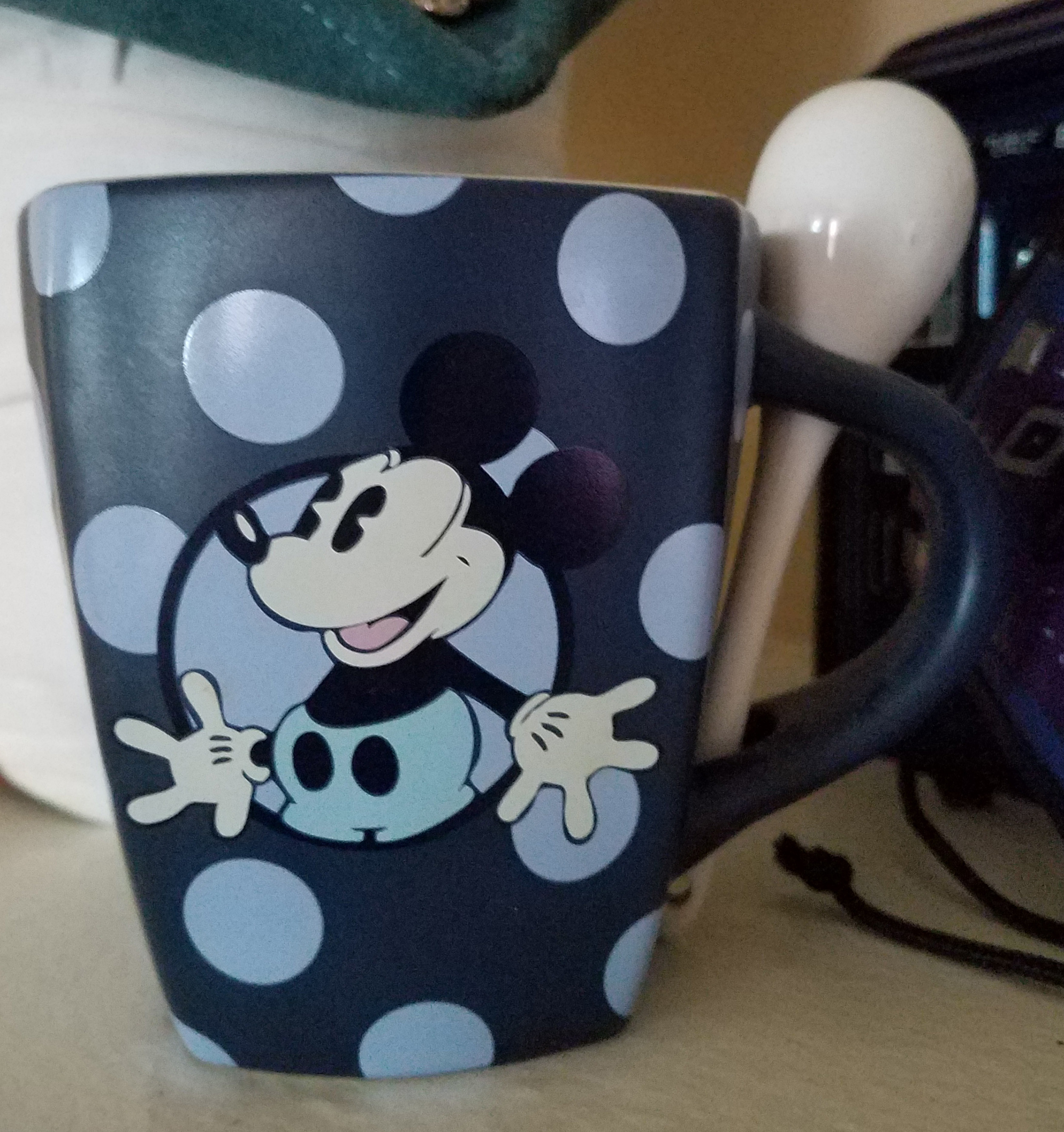Disney mug featuring Mickey on blue polka dots